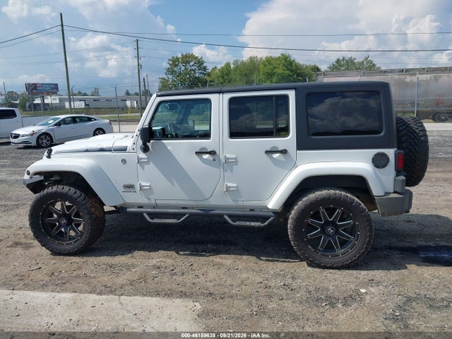 1C4BJWEG9EL200475 Jeep Wrangler Unlimited Polar Edition