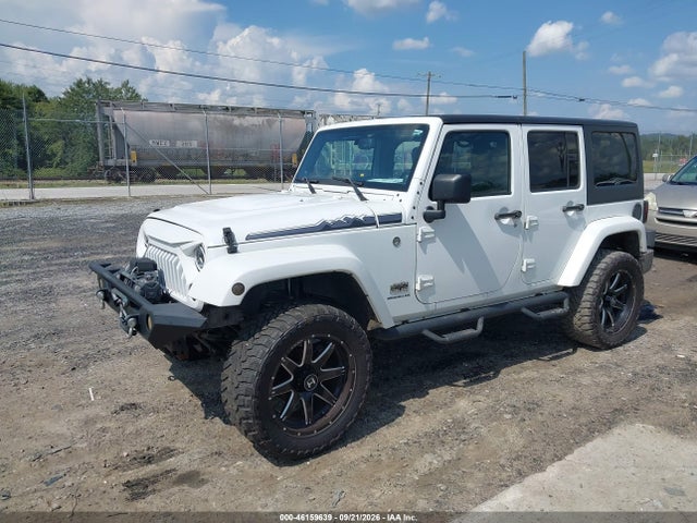 1C4BJWEG9EL200475 Jeep Wrangler Unlimited Polar Edition