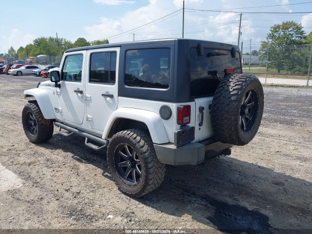 1C4BJWEG9EL200475 Jeep Wrangler Unlimited Polar Edition