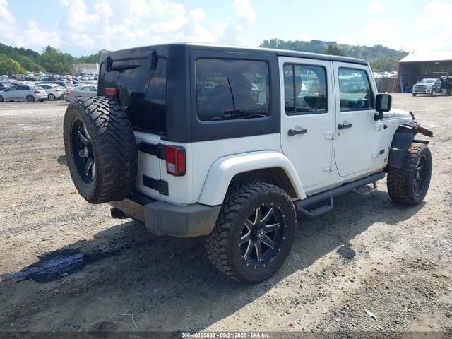 1C4BJWEG9EL200475 Jeep Wrangler Unlimited Polar Edition