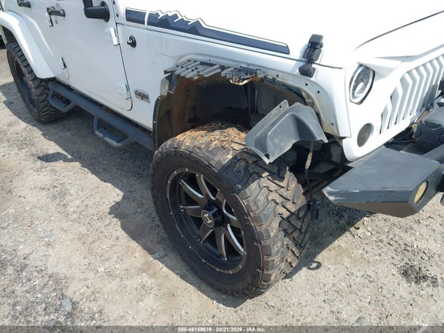 1C4BJWEG9EL200475 Jeep Wrangler Unlimited Polar Edition