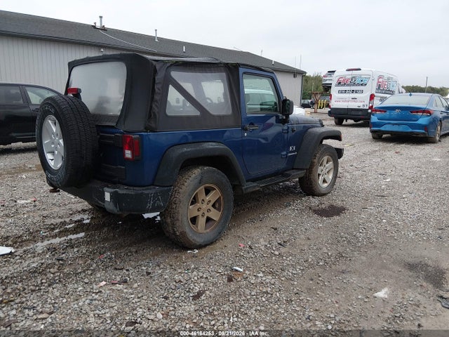 2009 Jeep Wrangler X მანქანა იყიდება აუქციონზე, vin: 1J8FA24149L712828, აუქციონის ნომერი: 46164253