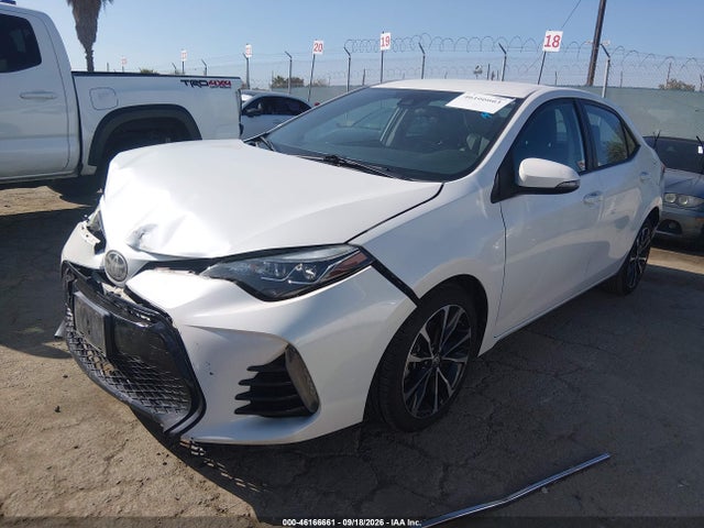 5YFBURHE3JP765082 Toyota COROLLA SE
