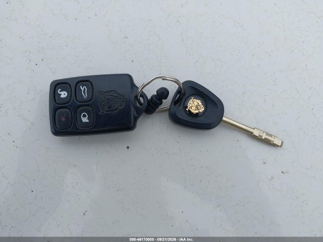46170005 :رقم المزاد ، SAJGX204XXC040315 vin ، 1999 Jaguar Xk8 مزاد بيع