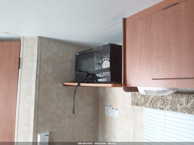 46181675 :رقم المزاد ، 4EXTK1414B5038688 vin ، 2011 Sportsmen 13 Camper Trailer مزاد بيع