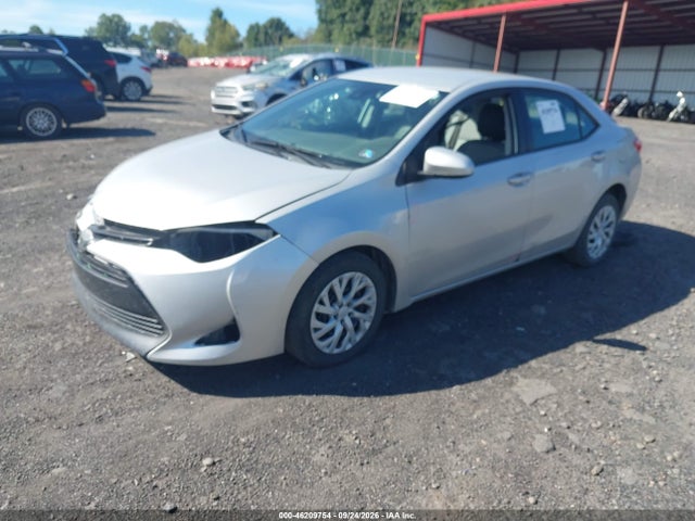 46209754 :رقم المزاد ، 5YFBURHE4JP809428 vin ، 2018 Toyota Corolla Le مزاد بيع