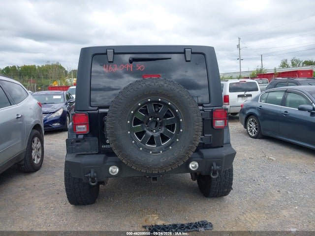 46209950 :رقم المزاد ، 1C4BJWDG1FL560830 vin ، 2015 Jeep Wrangler Unlimited Freedom Edition مزاد بيع