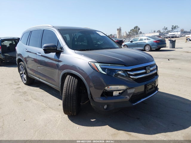 Продаж на аукціоні авто 2018 Honda Pilot Touring, vin: 5FNYF5H92JB004197, номер лоту: 46211253