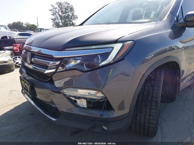 Продаж на аукціоні авто 2018 Honda Pilot Touring, vin: 5FNYF5H92JB004197, номер лоту: 46211253