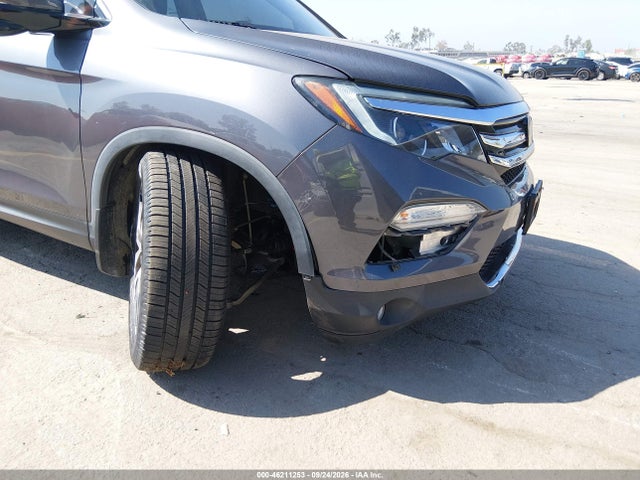 Продаж на аукціоні авто 2018 Honda Pilot Touring, vin: 5FNYF5H92JB004197, номер лоту: 46211253