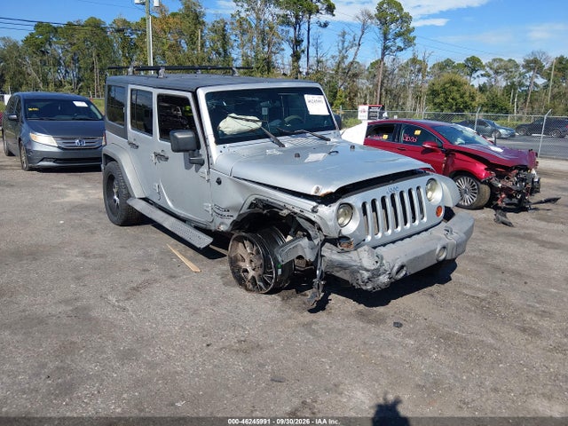 46245991 :رقم المزاد ، 1J4BA3H10BL596923 vin ، 2011 Jeep Wrangler Unlimited Sport مزاد بيع