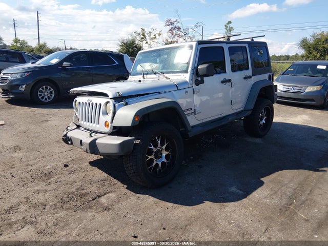 46245991 :رقم المزاد ، 1J4BA3H10BL596923 vin ، 2011 Jeep Wrangler Unlimited Sport مزاد بيع