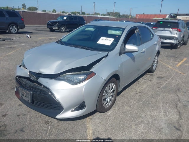 46259901 :رقم المزاد ، 5YFBURHE2JP829354 vin ، 2018 Toyota Corolla Le مزاد بيع