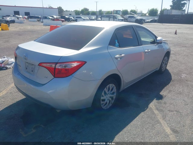 46259901 :رقم المزاد ، 5YFBURHE2JP829354 vin ، 2018 Toyota Corolla Le مزاد بيع