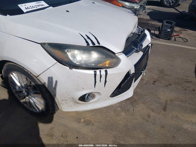 Продажа на аукционе авто 2013 Ford Focus Titanium, vin: 1FADP3J23DL198694, номер лота: 46262996