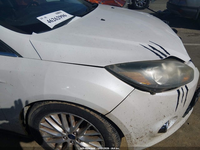 Продажа на аукционе авто 2013 Ford Focus Titanium, vin: 1FADP3J23DL198694, номер лота: 46262996