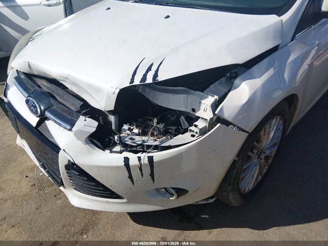 Продажа на аукционе авто 2013 Ford Focus Titanium, vin: 1FADP3J23DL198694, номер лота: 46262996