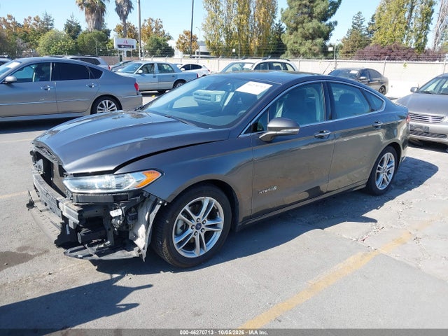 2016 Ford Fusion Hybrid Titanium მანქანა იყიდება აუქციონზე, vin: 3FA6P0RU3GR166377, აუქციონის ნომერი: 46270713