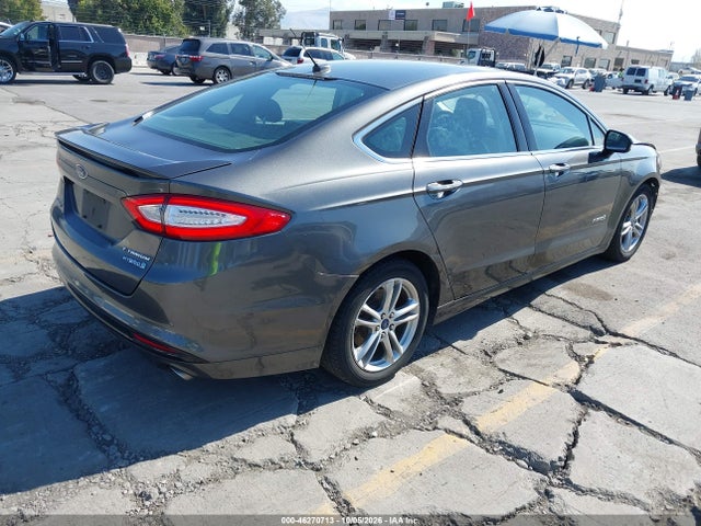 2016 Ford Fusion Hybrid Titanium მანქანა იყიდება აუქციონზე, vin: 3FA6P0RU3GR166377, აუქციონის ნომერი: 46270713