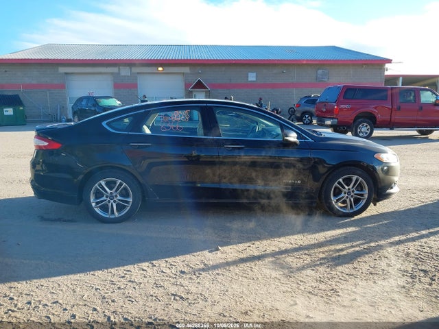 2016 Ford Fusion Hybrid Titanium მანქანა იყიდება აუქციონზე, vin: 3FA6P0RU3GR162233, აუქციონის ნომერი: 46288366