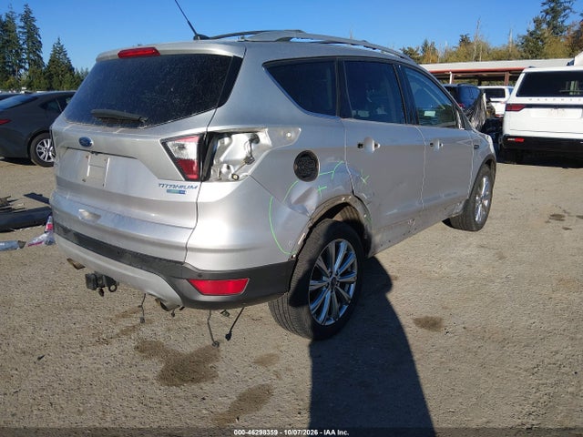 Продажа на аукционе авто 2017 Ford Escape Titanium, vin: 1FMCU9J97HUA51207, номер лота: 46298359