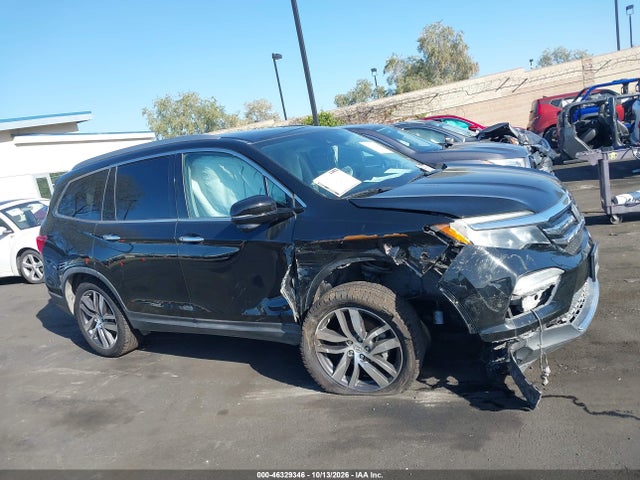 Продаж на аукціоні авто 2017 Honda Pilot Touring, vin: 5FNYF6H94HB027870, номер лоту: 46329346