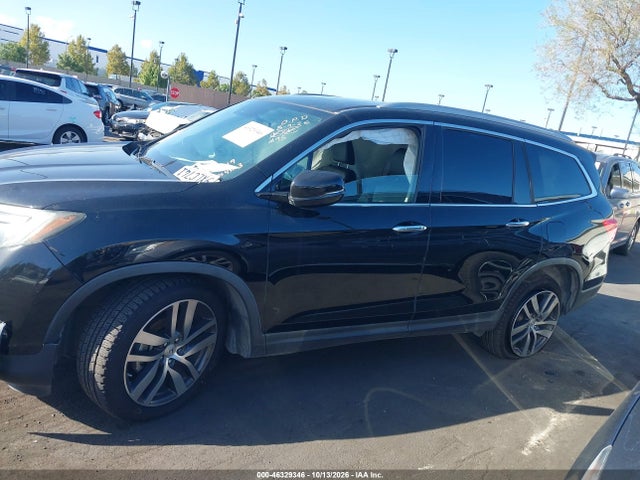 Продаж на аукціоні авто 2017 Honda Pilot Touring, vin: 5FNYF6H94HB027870, номер лоту: 46329346
