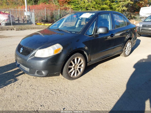 46332616 :رقم المزاد ، JS2YC417396200691 vin ، 2009 Suzuki Sx4 Sport Touring مزاد بيع