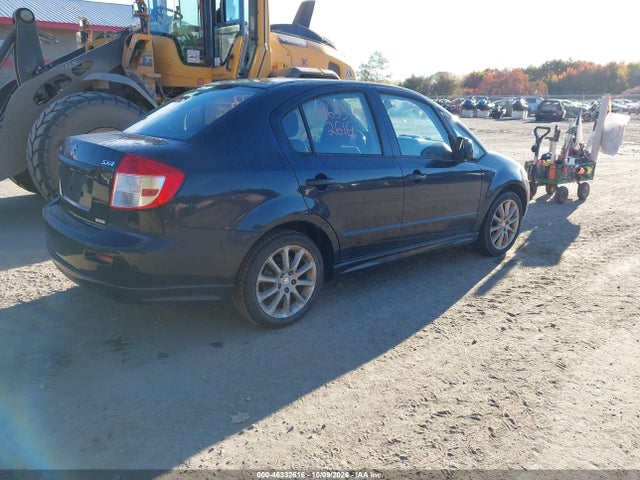 46332616 :رقم المزاد ، JS2YC417396200691 vin ، 2009 Suzuki Sx4 Sport Touring مزاد بيع