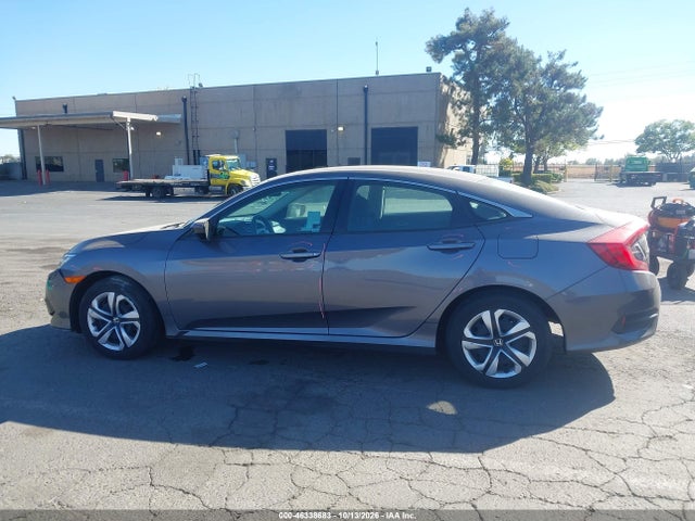 2HGFC2F52JH608035 Honda Civic Lx