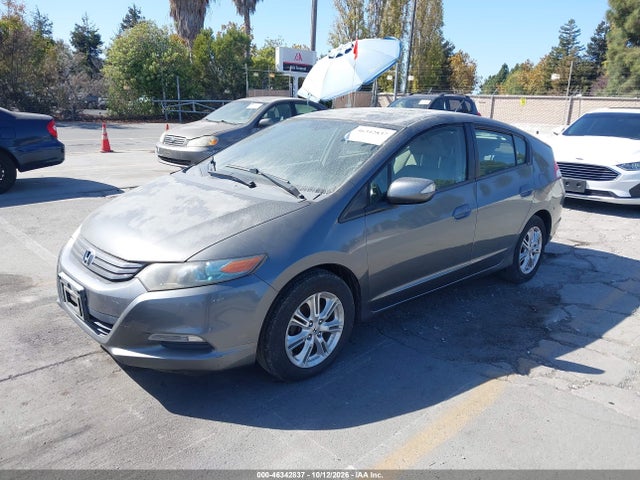 2010 Honda Insight Ex მანქანა იყიდება აუქციონზე, vin: JHMZE2H76AS024877, აუქციონის ნომერი: 46342837