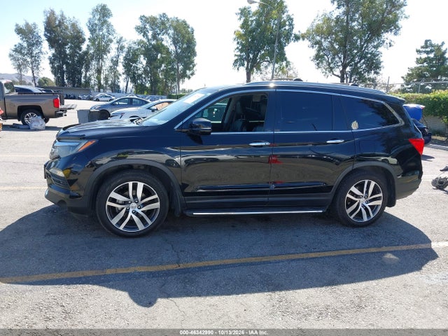 Продажа на аукционе авто 2016 Honda Pilot Touring, vin: 5FNYF5H95GB041561, номер лота: 46342990