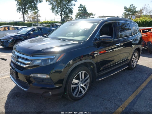 Продажа на аукционе авто 2016 Honda Pilot Touring, vin: 5FNYF5H95GB041561, номер лота: 46342990