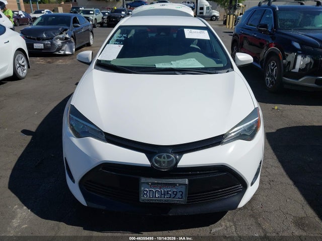 46355495 :رقم المزاد ، 5YFBURHE7JP750455 vin ، 2018 Toyota Corolla Le مزاد بيع
