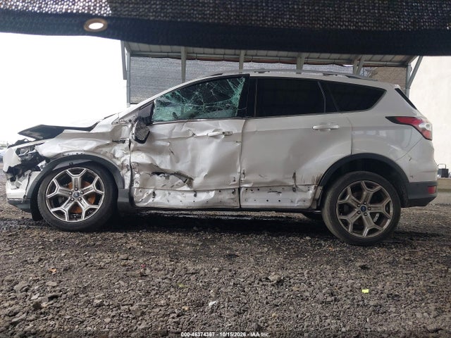 Продажа на аукционе авто 2017 Ford Escape Titanium, vin: 1FMCU9J97HUB34801, номер лота: 46374367
