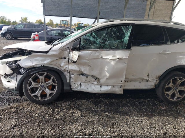 Продажа на аукционе авто 2017 Ford Escape Titanium, vin: 1FMCU9J97HUB34801, номер лота: 46374367