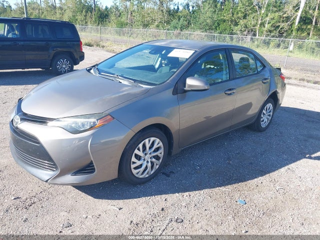 46375080 :رقم المزاد ، 5YFBURHE6JP743254 vin ، 2018 Toyota Corolla Le مزاد بيع