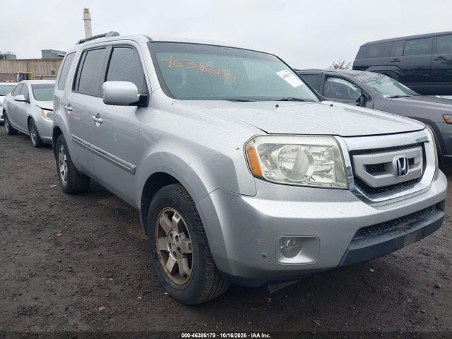 Продажа на аукционе авто 2011 Honda Pilot Touring, vin: 5FNYF4H91BB507358, номер лота: 46386179