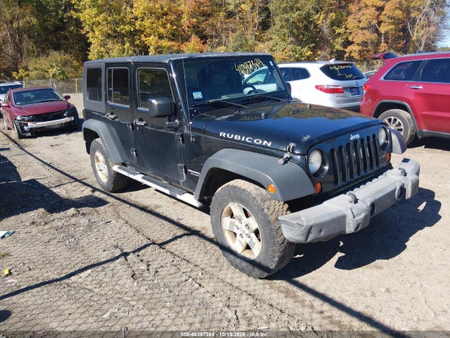 2007 Jeep Wrangler Unlimited Rubicon მანქანა იყიდება აუქციონზე, vin: 1J8GA69127L112729, აუქციონის ნომერი: 46397384