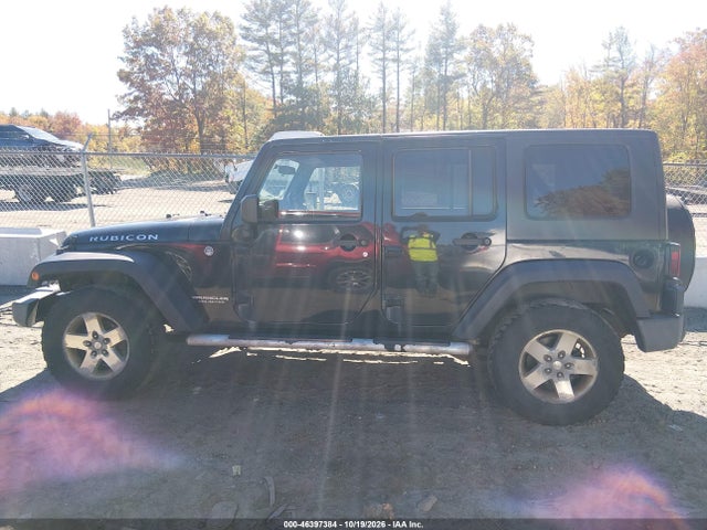 2007 Jeep Wrangler Unlimited Rubicon მანქანა იყიდება აუქციონზე, vin: 1J8GA69127L112729, აუქციონის ნომერი: 46397384
