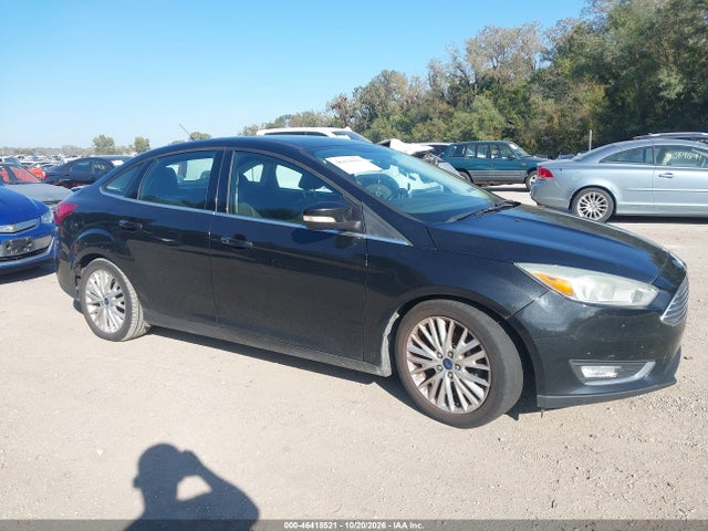 Продажа на аукционе авто 2015 Ford Focus Titanium, vin: 1FADP3J28FL201270, номер лота: 46418521