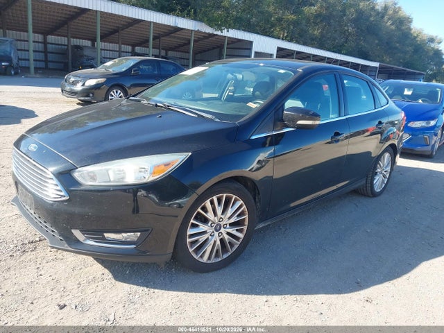 Продажа на аукционе авто 2015 Ford Focus Titanium, vin: 1FADP3J28FL201270, номер лота: 46418521
