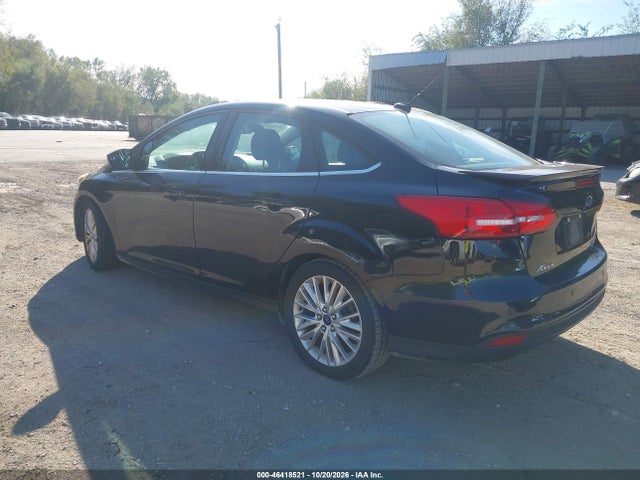 Продажа на аукционе авто 2015 Ford Focus Titanium, vin: 1FADP3J28FL201270, номер лота: 46418521