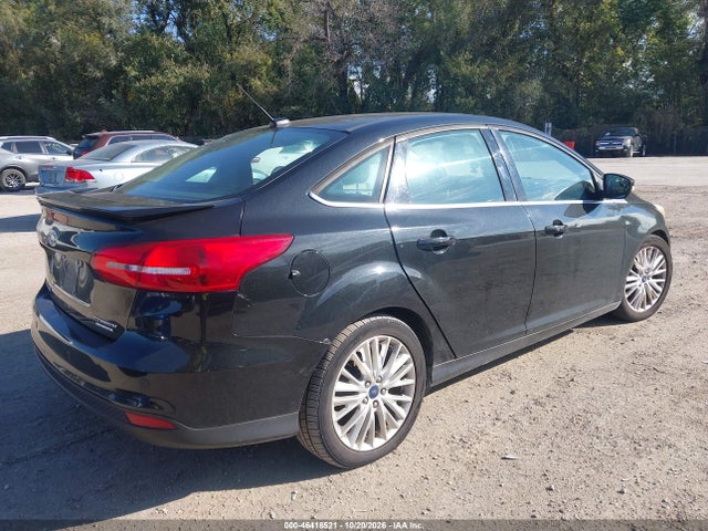 Продажа на аукционе авто 2015 Ford Focus Titanium, vin: 1FADP3J28FL201270, номер лота: 46418521