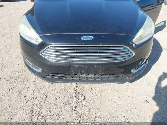 Продажа на аукционе авто 2015 Ford Focus Titanium, vin: 1FADP3J28FL201270, номер лота: 46418521