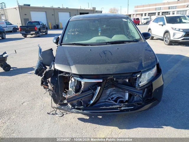 20204067 :رقم المزاد ، 5FNRL5H62EB512064 vin ، 2014 Honda Odyssey Ex-l مزاد بيع