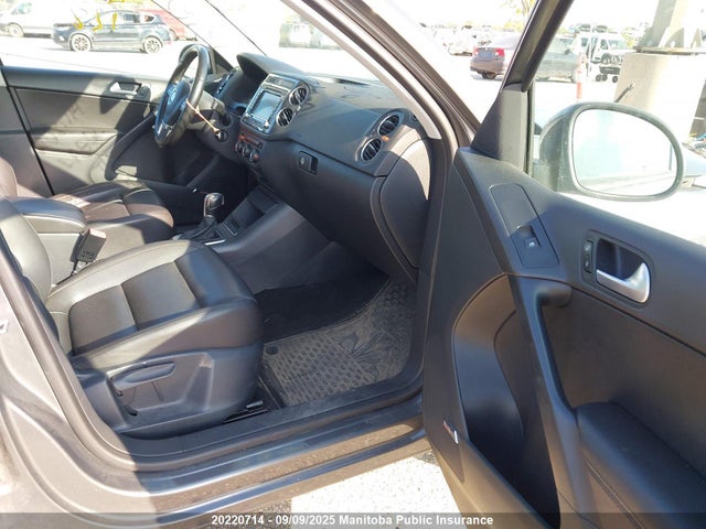 WVGJV3AX9EW568069 Volkswagen Tiguan