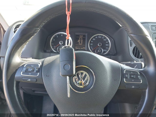 WVGJV3AX9EW568069 Volkswagen Tiguan
