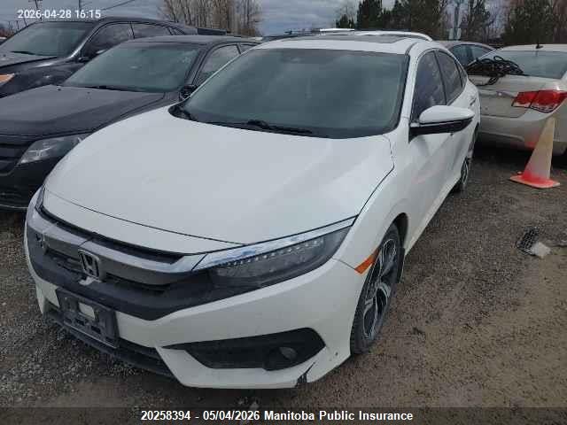 Продажа на аукционе авто 2017 Honda Civic Touring, vin: 2HGFC1F94HH101404, номер лота: 20258394