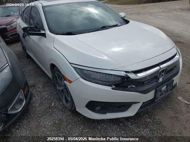 Продажа на аукционе авто 2017 Honda Civic Touring, vin: 2HGFC1F94HH101404, номер лота: 20258394